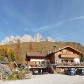 passo san pellegrino albergo miralago autunno