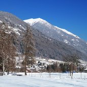 vista da dimaro verso monclassico inverno