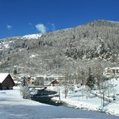 cartello mezzana e torrente noce inverno