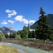 poza pozza di fassa con chiesa santa maria ausiliatrice torre mas la torn