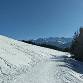 vista sul gruppo del Lagorai e in alto a sinistra Malga Cambroncoi