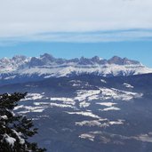 winter suedtirol aldein dahinter rosengarten