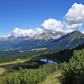 schwarzhorn speichersee dahinter dolomiten