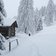 winterwald bei rosengarten karerpass holzhuette